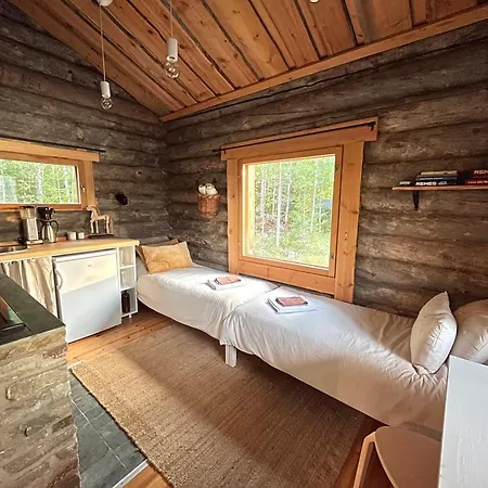 Chalet Pieni Kelosaunamoekki Jaerven Rannalla & Soutuvene Kotalahti