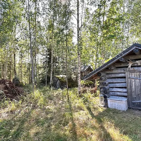 Pieni Kelosaunamoekki Jaerven Rannalla & Soutuvene Chalet Kotalahti